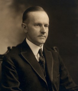 Calvin_Coolidge,_bw_head_and_shoulders_photo_portrait_seated,_1919